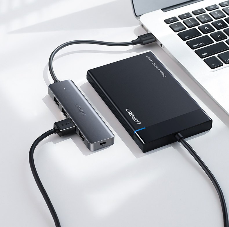 Hub USB UGREEN CM219, 4 x USB-A 3.0 - 1 x USB-C, Grigio